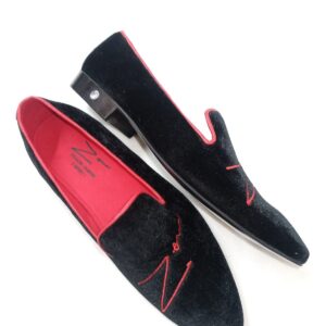 A Pair of Black and Red Shoes