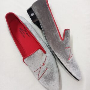 A Pair of Grey and Red Shoes