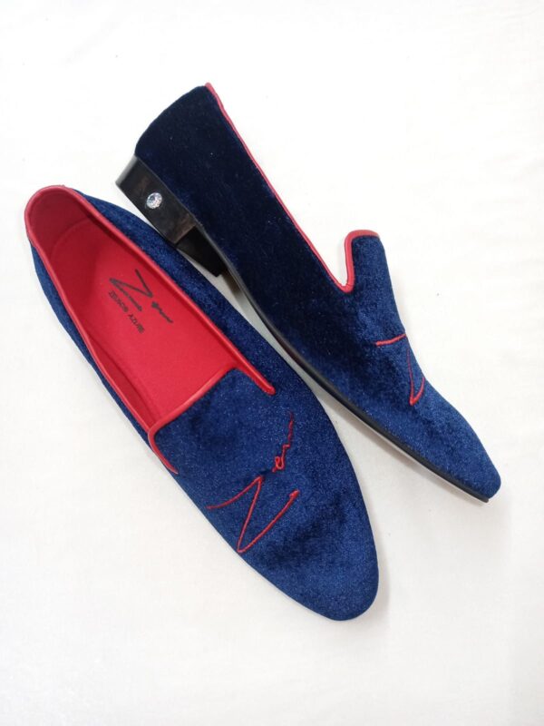 A Pair of Blue and Red Shoes